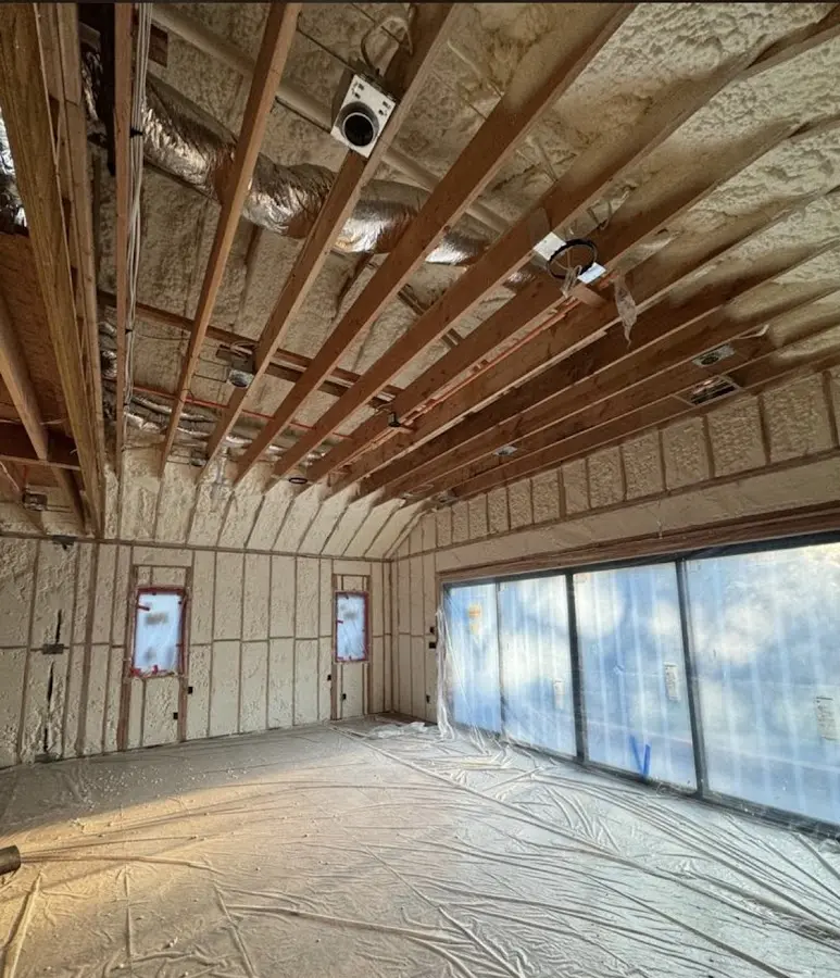 Interior walls and ceiling insulated with spray foam during new construction in Sulphur
